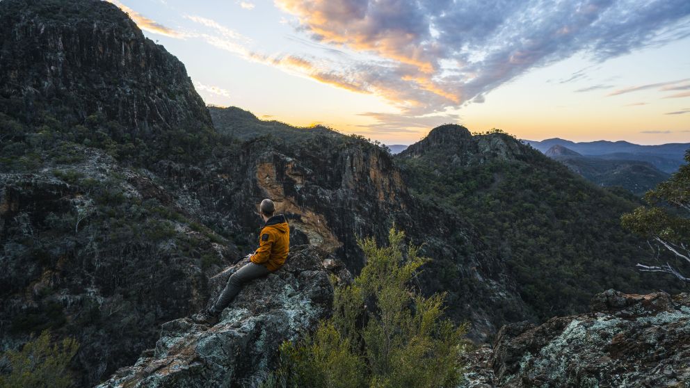 Man watching the sun set in the Warrumbungle National Park